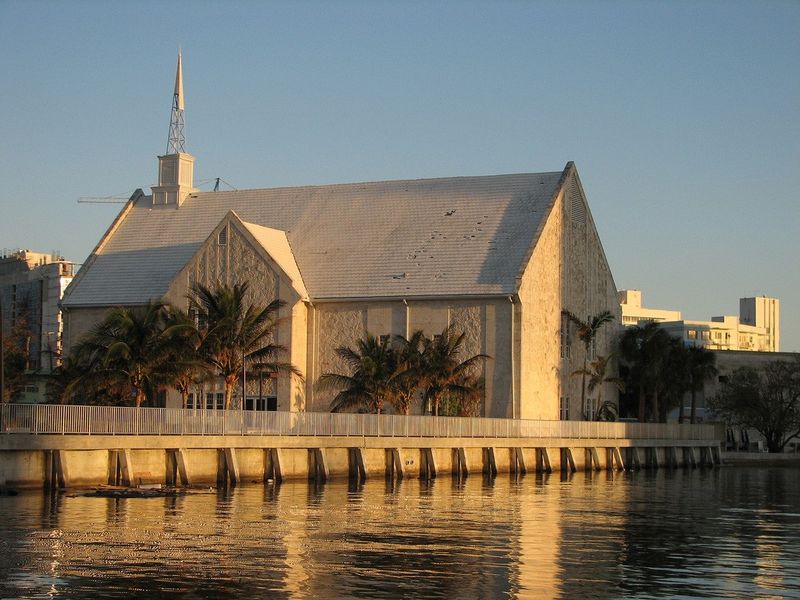 A chapel in Miami, Florida, reflected in nearby water.