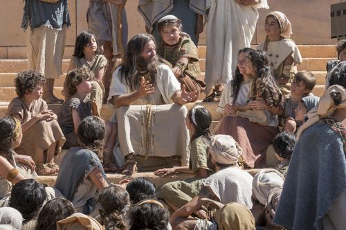 Jacob sits on the steps of the temple as he teaches the Nephites.
