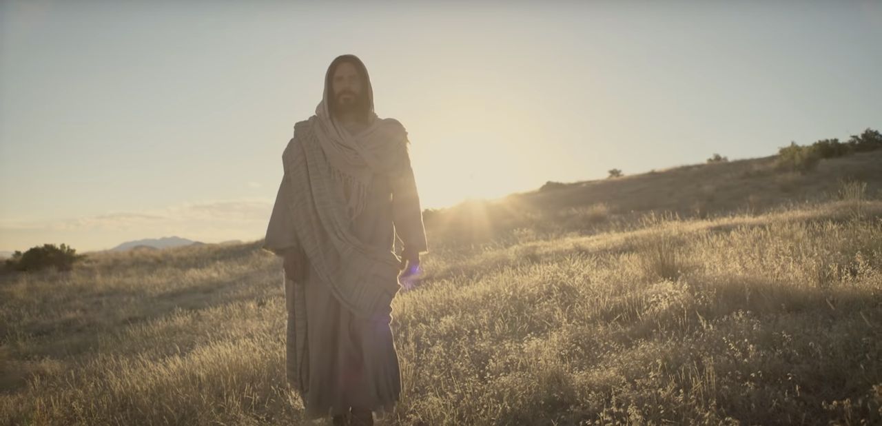 Jesus Christ walking through a field invites all to come unto Him