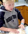 Girl kneading dough