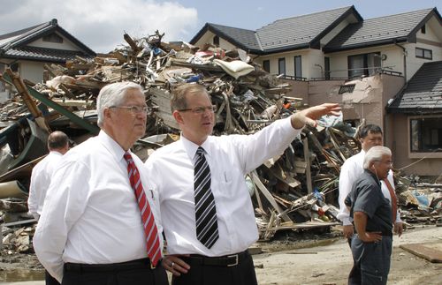 Elder Stevenson visiting a disaster zone