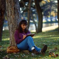 youth writing in journal