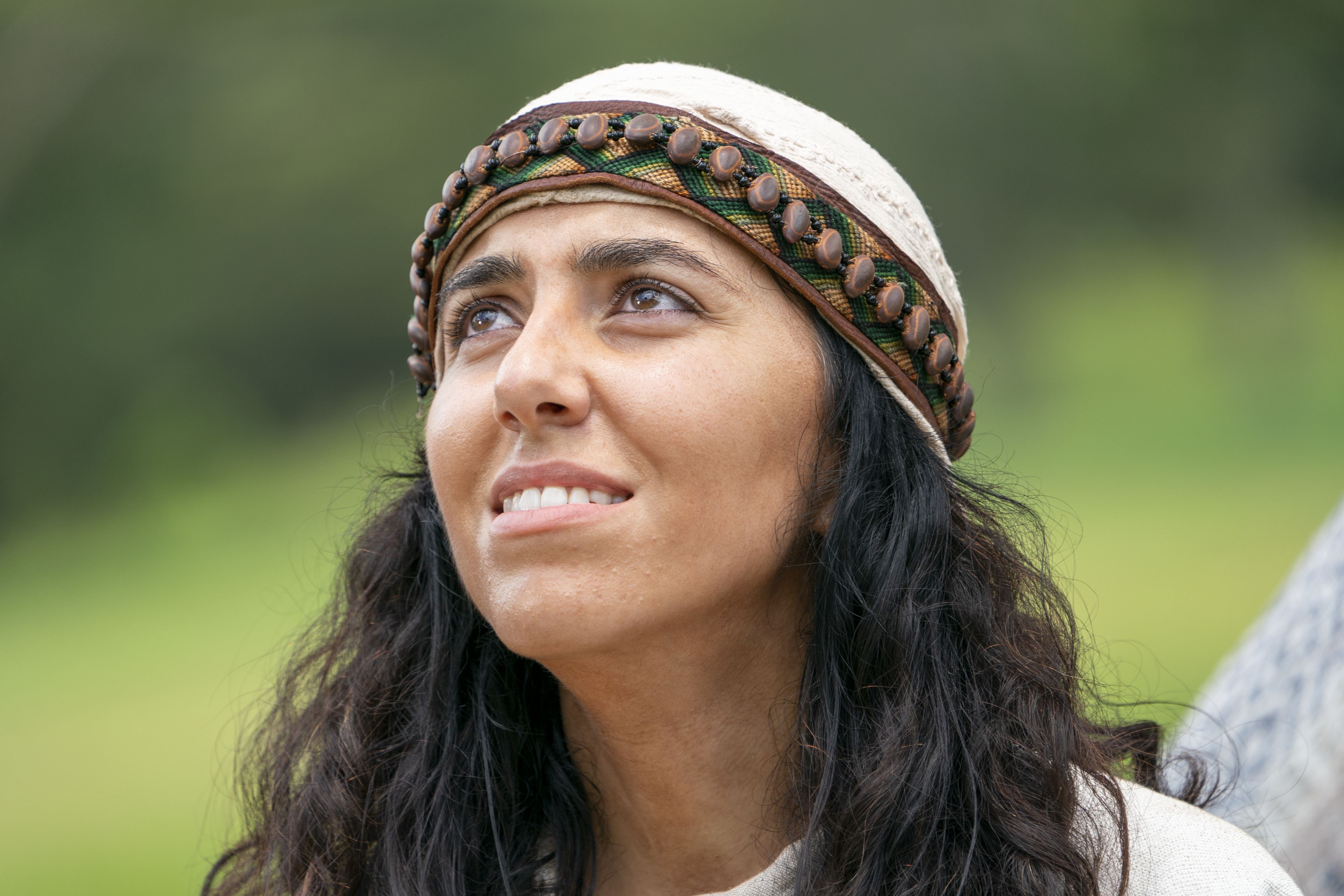 A Nephite woman listens to King Benjamin in the Land of Zarahemla.