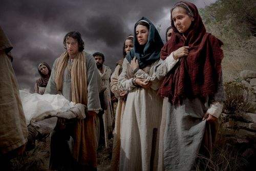 depiction of Jesus’s body being laid in the tomb