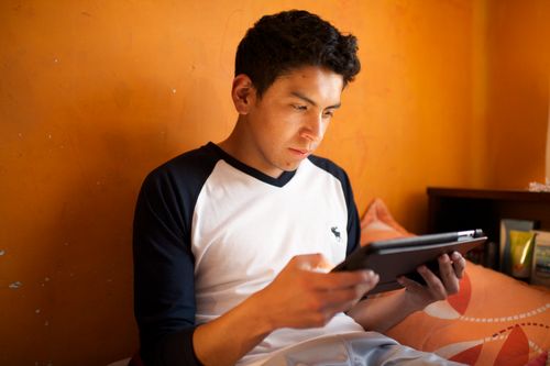 Young adult male studying in Bolivia