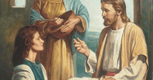 Christ seated in the home of Mary and Martha. Mary kneels at Christ’s feet, her hands clasped in her lap. Martha stands at Mary’s side. Martha is holding a mixing bowl and spoon in her hands. She is looking at Christ. A stone arched doorway is in the background.