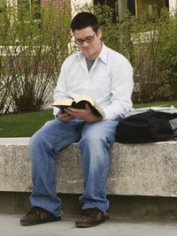 man studying scriptures