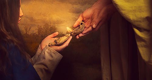 hands of Jesus Christ holding an oil lamp to light another lamp held by a woman