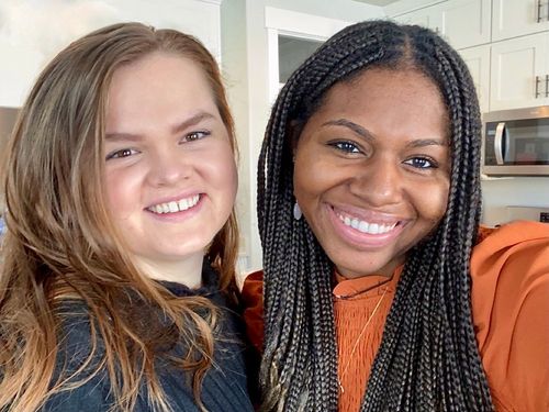 two smiling young women