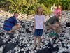 Wesley, McKenna, Audrey and Evelyn Kellogg at the beach.