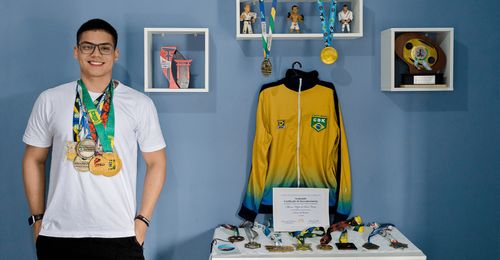 young man with awards