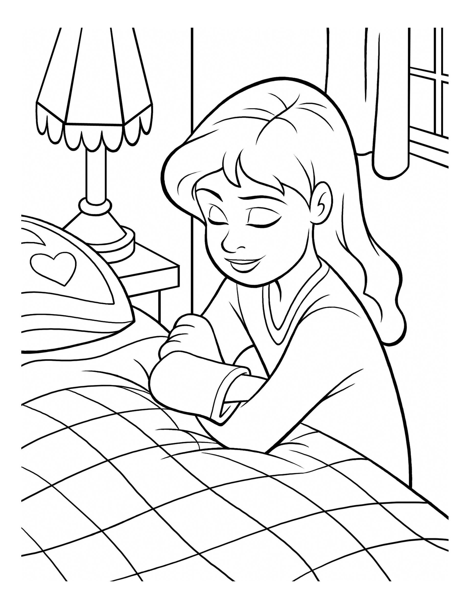 A girl kneels by her bed and prays.