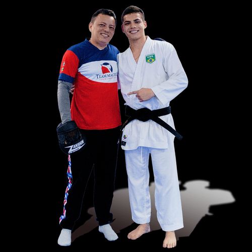 young man with martial arts trainer