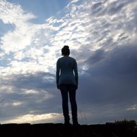 woman standing alone