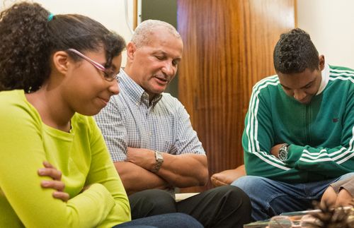 family praying