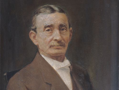 Oil portrait of George Careless.  Dark background. Solemn expression of man with mustache and hair parted in the middle.  Dressed in a brown suit, white shirt and white bow tie.  Subject is seated on a chair.