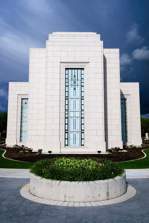 The back of the Vancouver British Columbia Temple, with the windows and grounds.