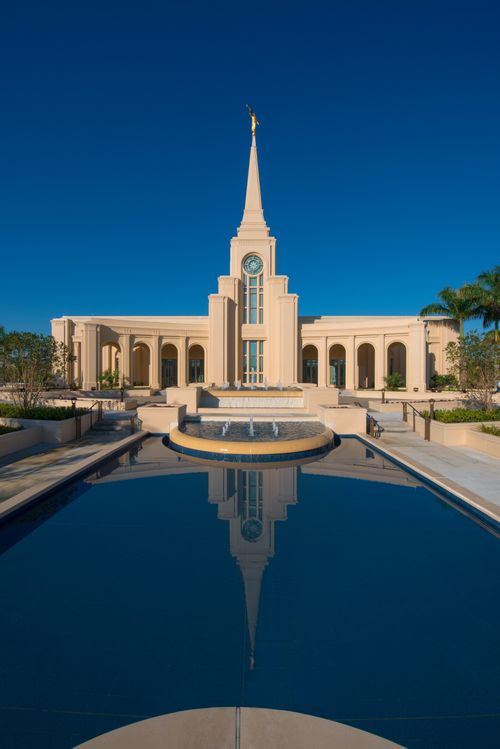 A view of the front entrance to the Fort Lauderdale Florida Temple, with a reflecting pool on the temple grounds.