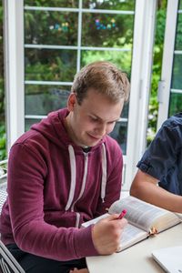 youth studying scriptures