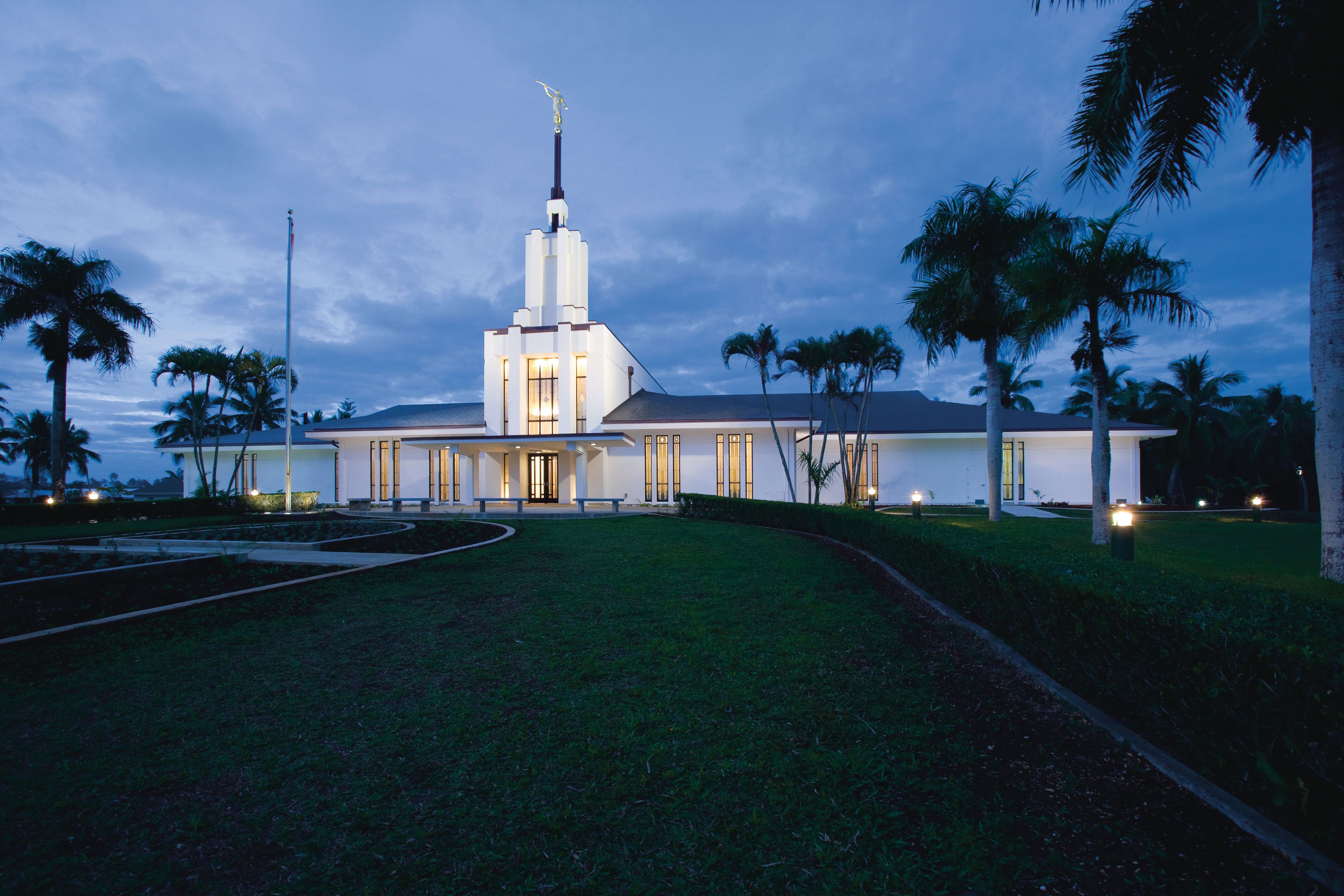 The Nuku‘alofa Tonga Temple in the evening, including the entrance and scenery.