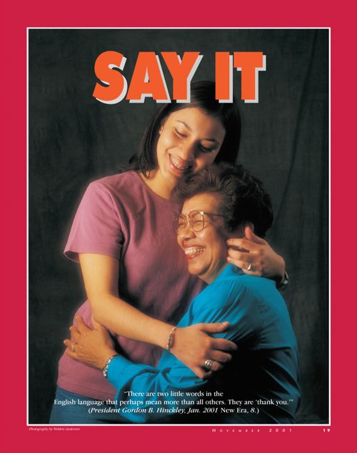 An image of a young woman hugging her mother, paired with the words “Say It."