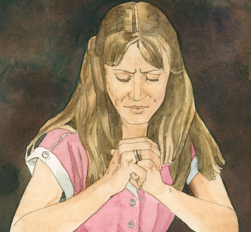 young woman praying