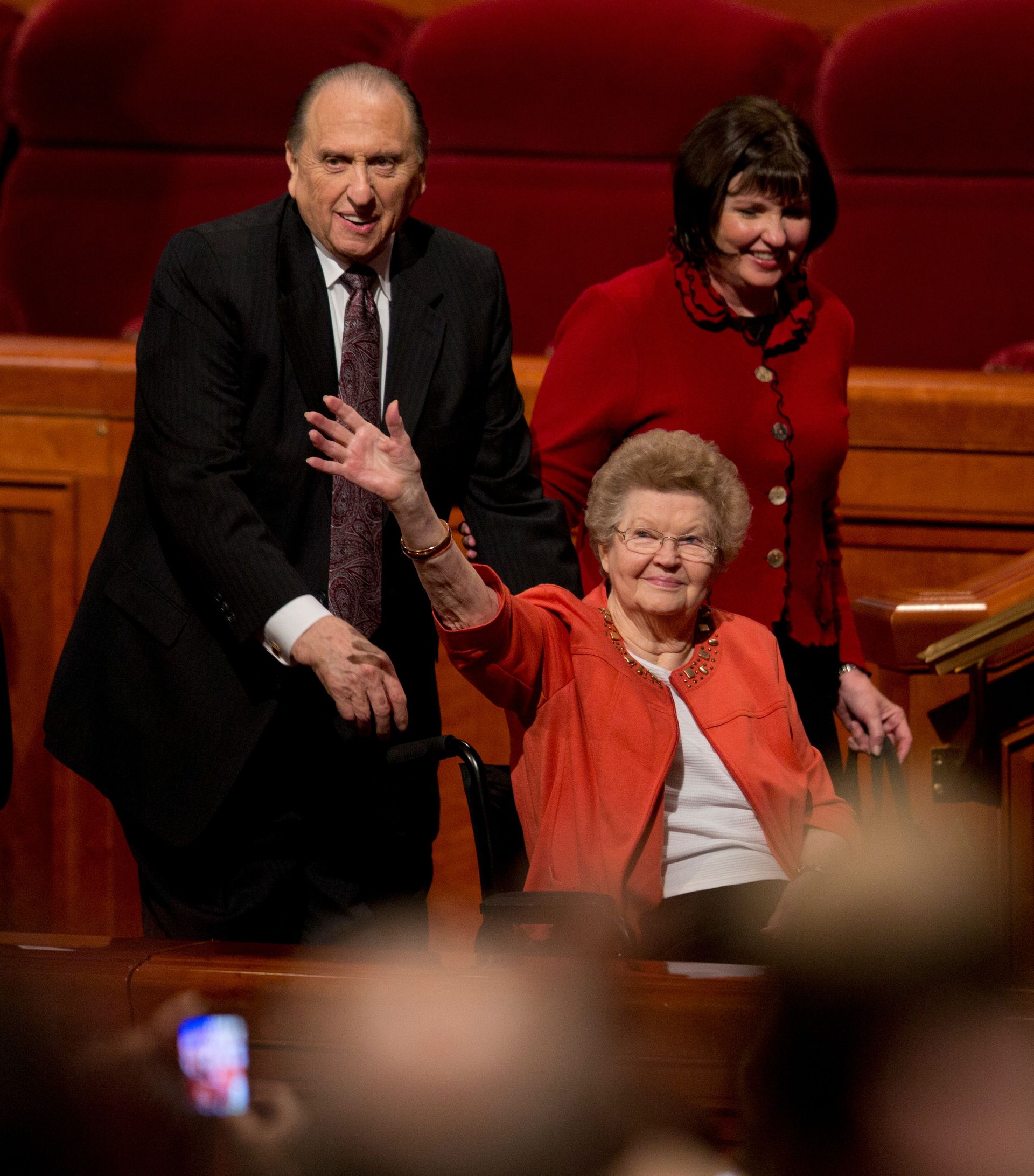 Thomas S. Monson exits the Conference Center with his wife, Frances, and daughter, Ann.