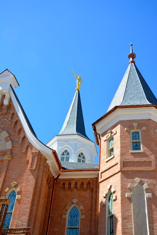 A close-up view of two of the spires of the Provo City Center Temple, one with the angel Moroni.
