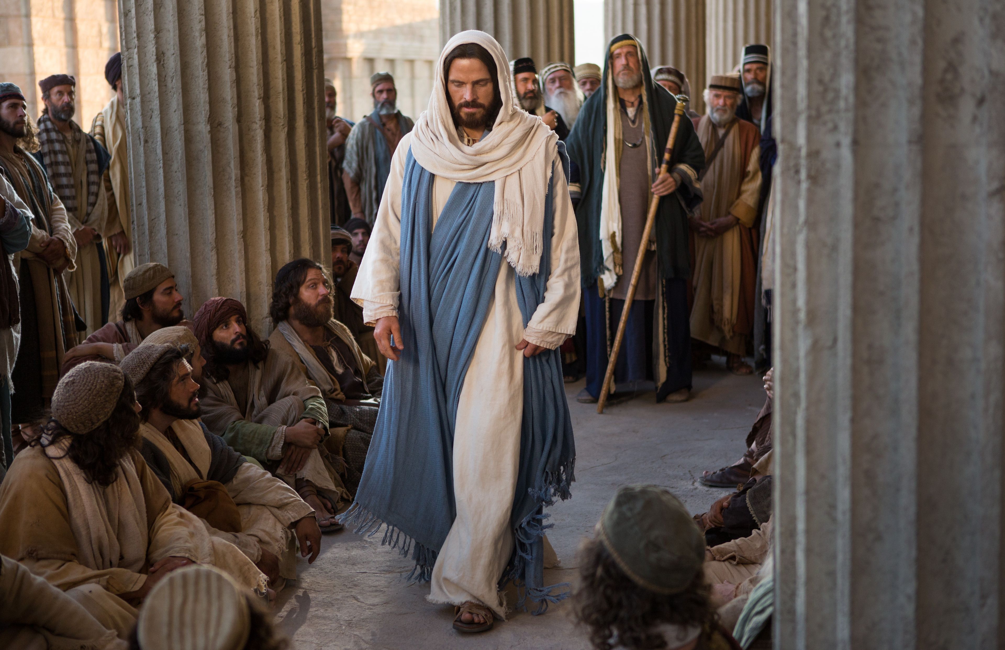Jesus teaches Pharisees as they question Him.