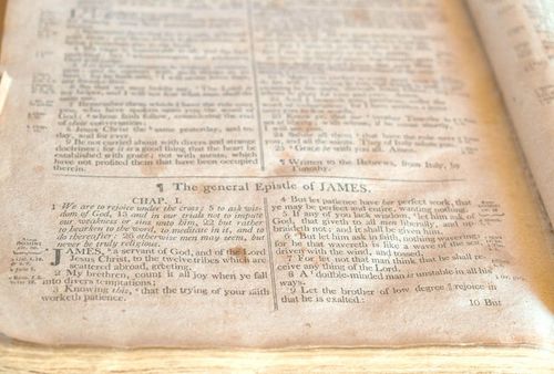 The beginning of the Book of James taken from an old worn Bible.