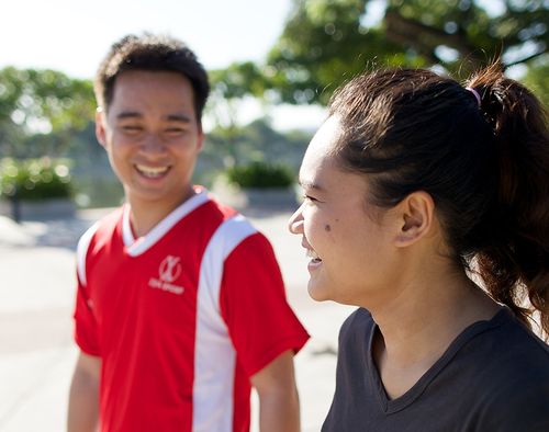 man and woman laughing