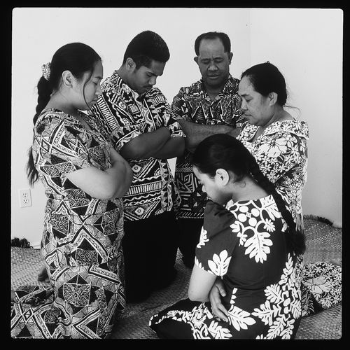 family praying