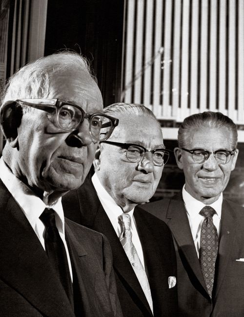 Joseph Fielding Smith standing with his two counselors in the First Presidency, Harold B. Lee and N. Eldon Tanner.