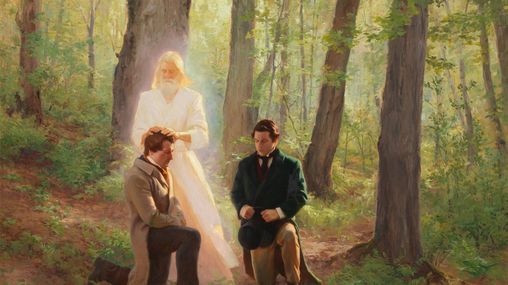 John the Baptist laying his hands on a kneeling Joseph Smith conferring the Aaronic Priesthood on him.  Oliver Cowdery is kneeling with him. They are in a grove of trees.