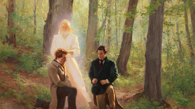 John the Baptist laying his hands on a kneeling Joseph Smith conferring the Aaronic Priesthood on him.  Oliver Cowdery is kneeling with him. They are in a grove of trees.