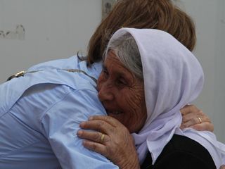 Two women hugging