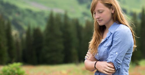 young woman praying