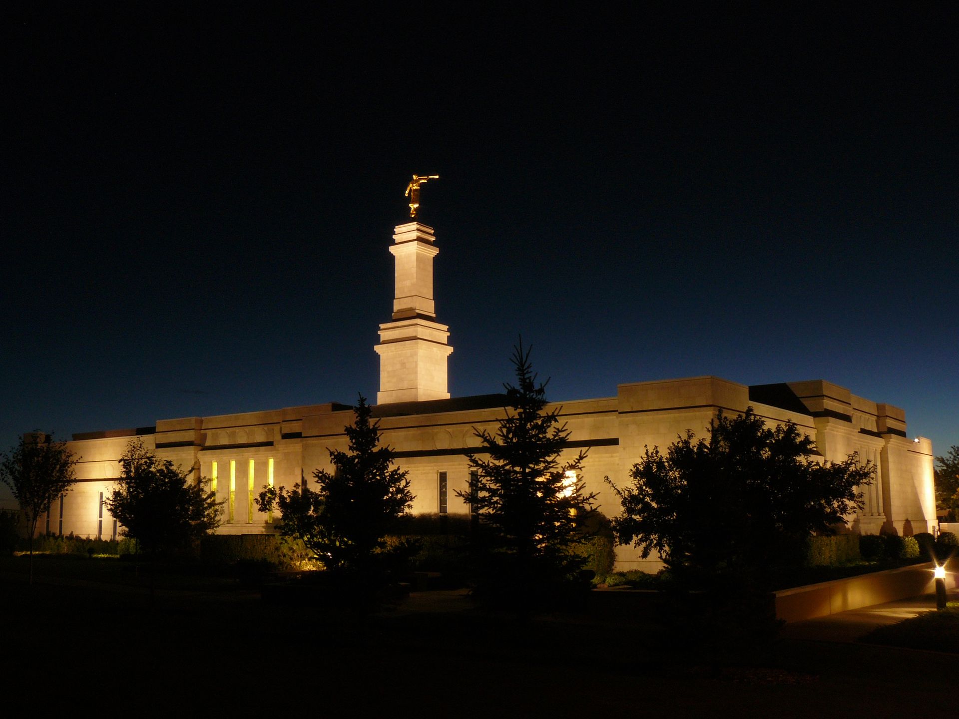 The Monticello Utah Temple in the evening, including scenery.