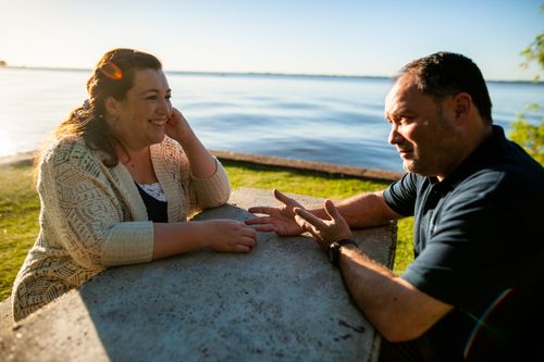 man and woman talking