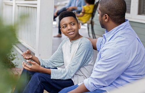 father talking with his son