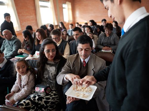 A series of images of members of the Plumerillo Ward attending church services. Images include photos from sacrament meeting, Primary, Priesthood, Relief Society, Young Men/Women, and Sunday School.