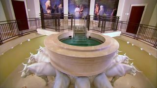 baptism being performed in the temple