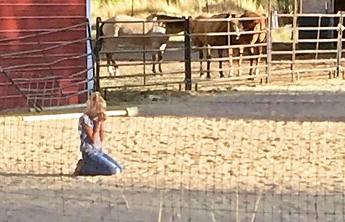 girl kneeling in prayer