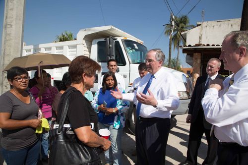 Elder Neil L. Andersen visiting people in Mexico