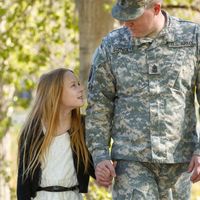 father and daughter walking