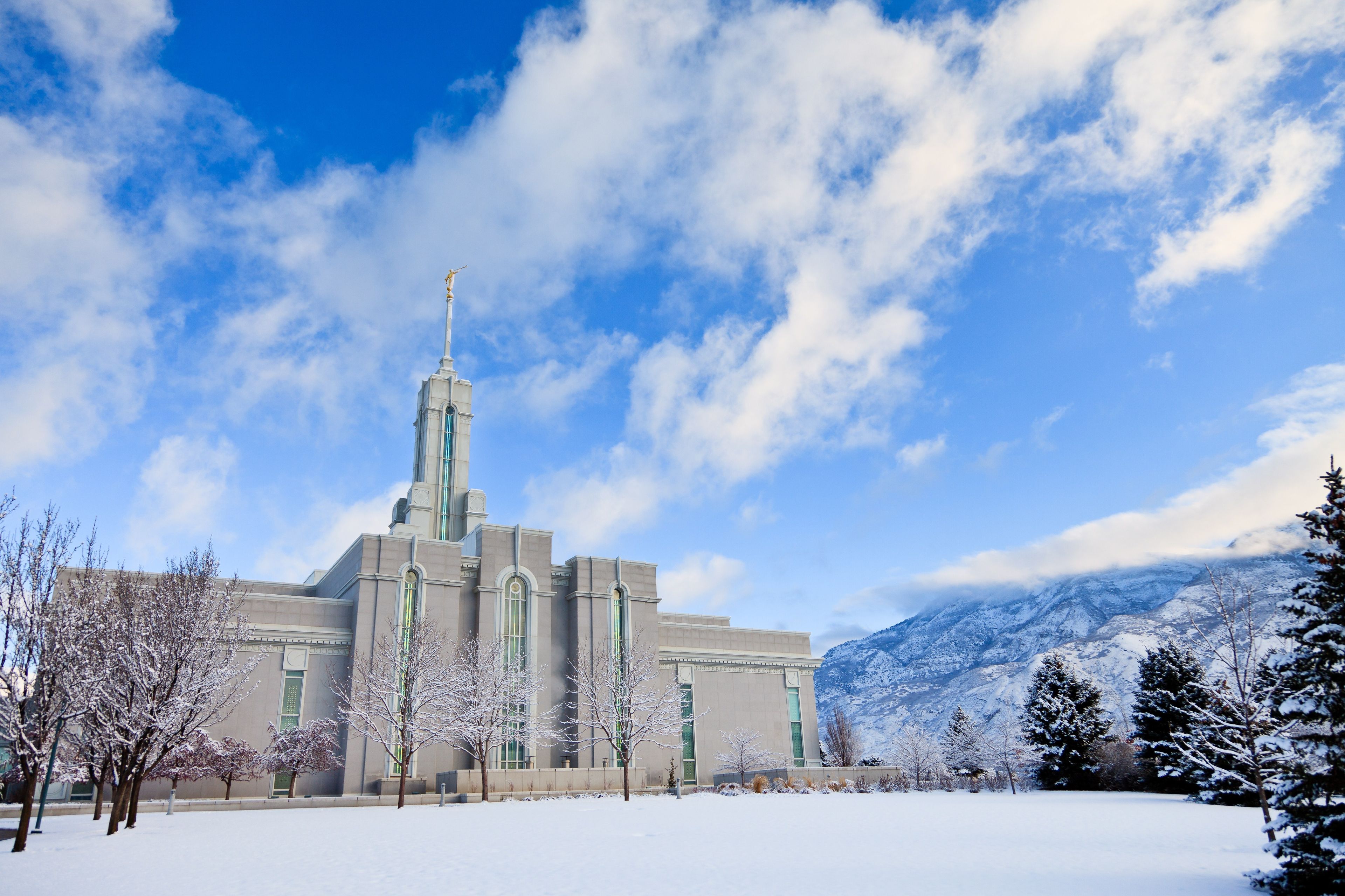 The Mount Timpanogos Utah Temple in the winter, including scenery.