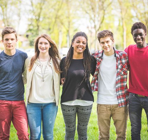 group of teenage friends outside