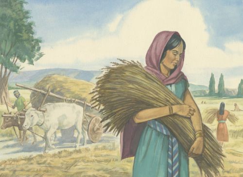 woman carrying wheat