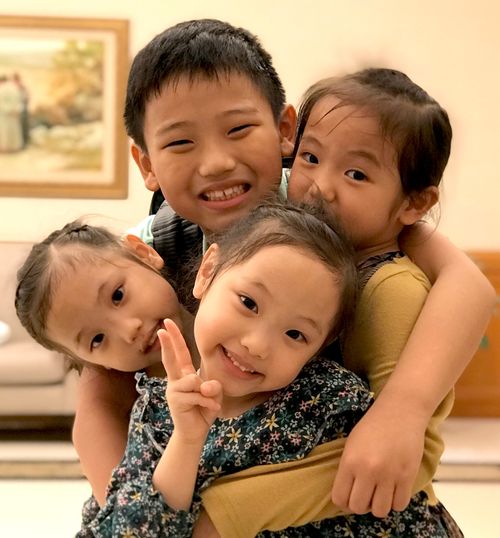 A picture of Jun Eui Lee, Seona Lee, Bella Lee and Tessa Lee.