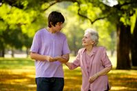 youth caring for elderly person